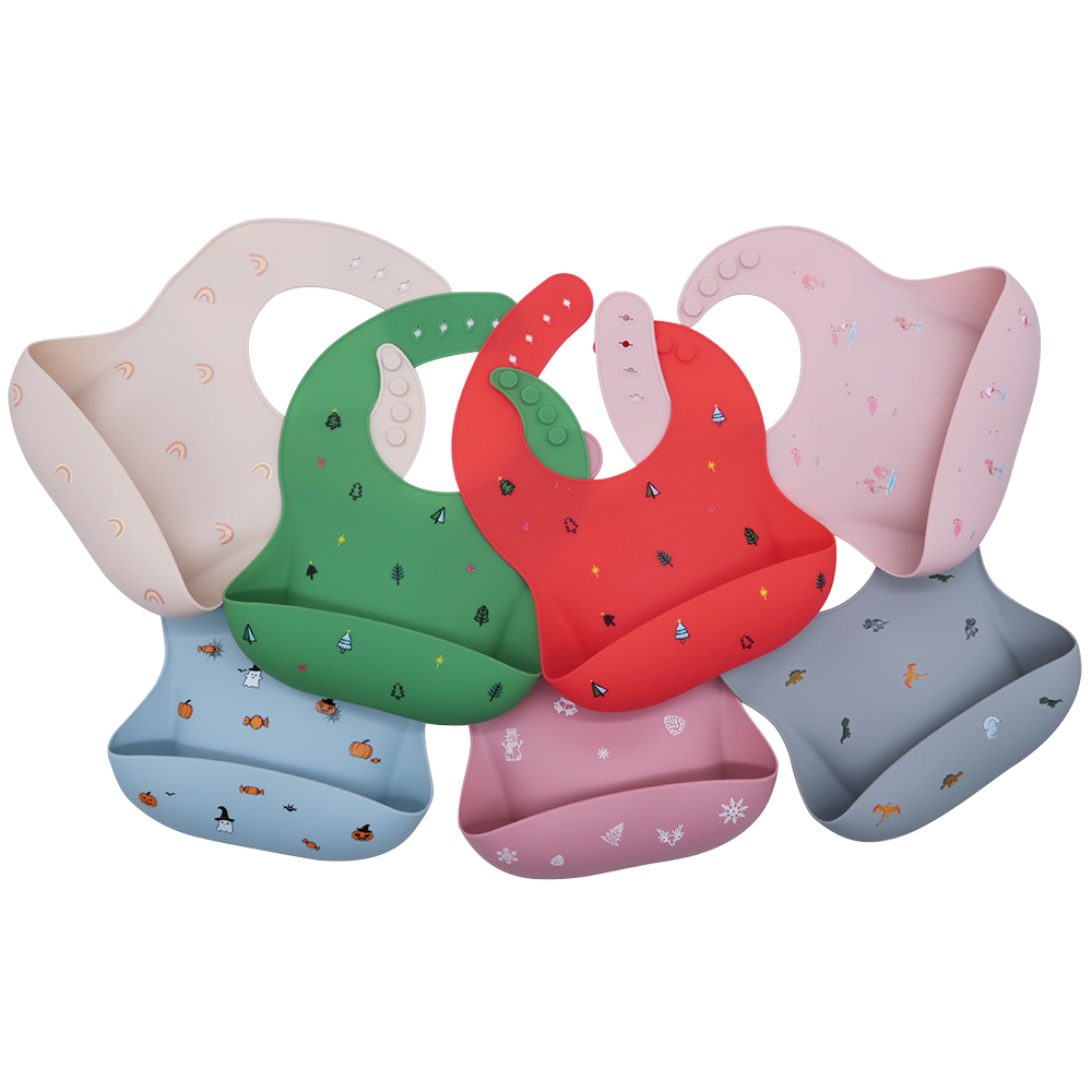 https://www.silicone-wholesale.com/waterproof-silicone-bib-with-with-pockets-l-melikey.html