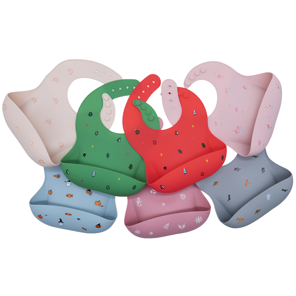 https://www.silicone-wholesale.com/waterproof-silicone-bib-with-pockets-l-melikey.html