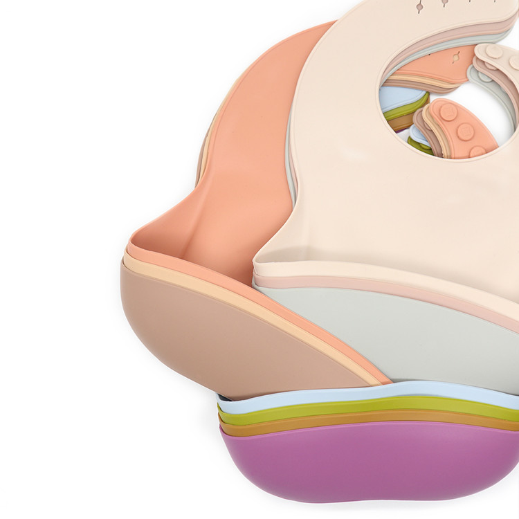 https://www.silicone-wholesale.com/waterproof-silicone-bib-pock-sewockets-l-melikey.html
