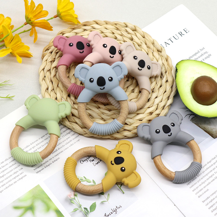 https://www.silicon-wholesale.com/silicon-and-wood-teether-ring-food-grade-oem-china.html