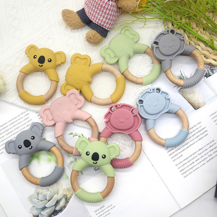 https://www.silicone-wholesale.com/silicone-and-wood-teether-ring-food-grade-oem-china.html