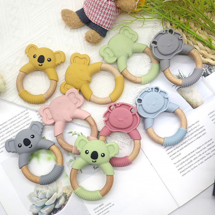 https://www.silicon-wholesale.com/silicon-and-wood-teether-ring-food-grade-oem-china.html