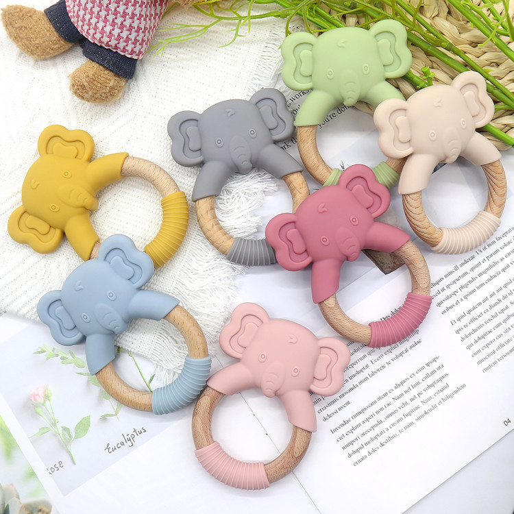 https://www.silicon-wholesale.com/silicon-and-wood-teether-ring-food-grade-oem-china.html