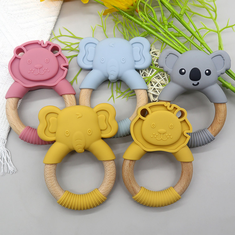 https://www.silicone-wholesale.com/silicone-and-wood-mordedor-ring-food-grade-oem-china.html