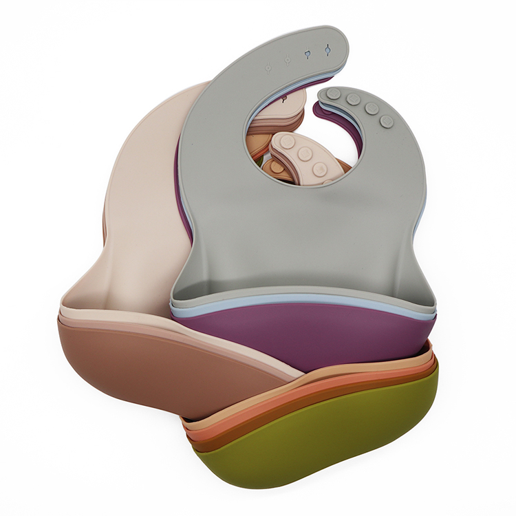 https://www.silicone-wholesale.com/waterproof-silicone-bib-with-pockets-l-melike.html