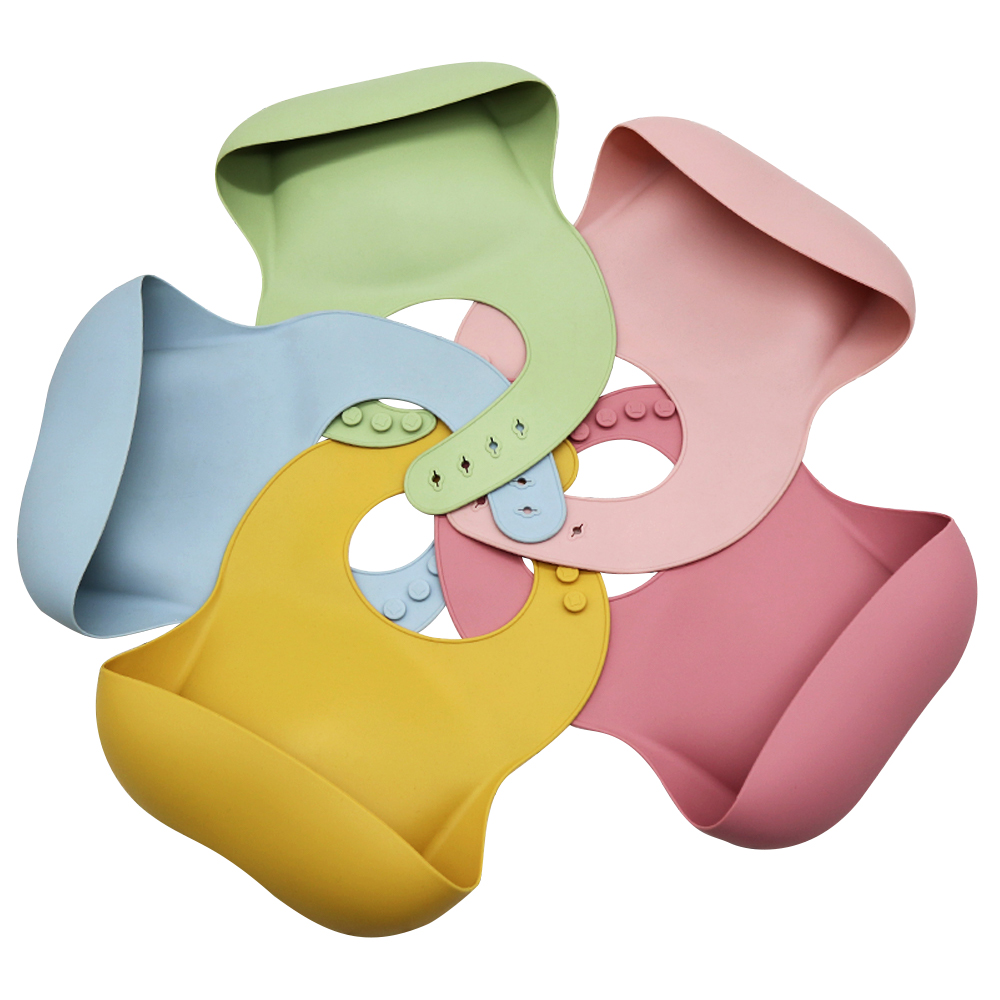 https://www.silicone-wholesale.com/waterproof-silicone-bib-with-pockets-l-melikey.html